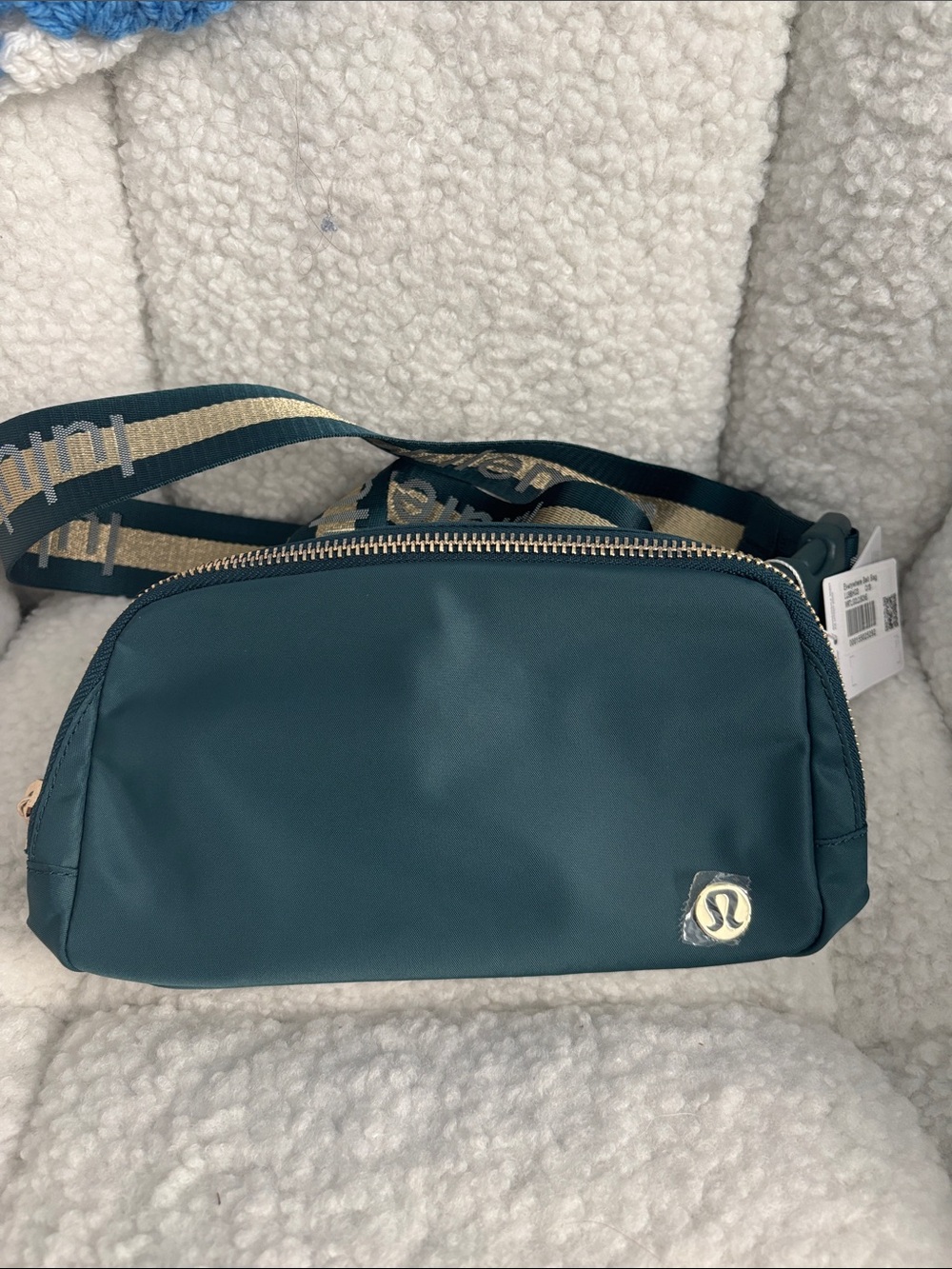 lululemon athletica teal green crossbody belt bag with gold accents